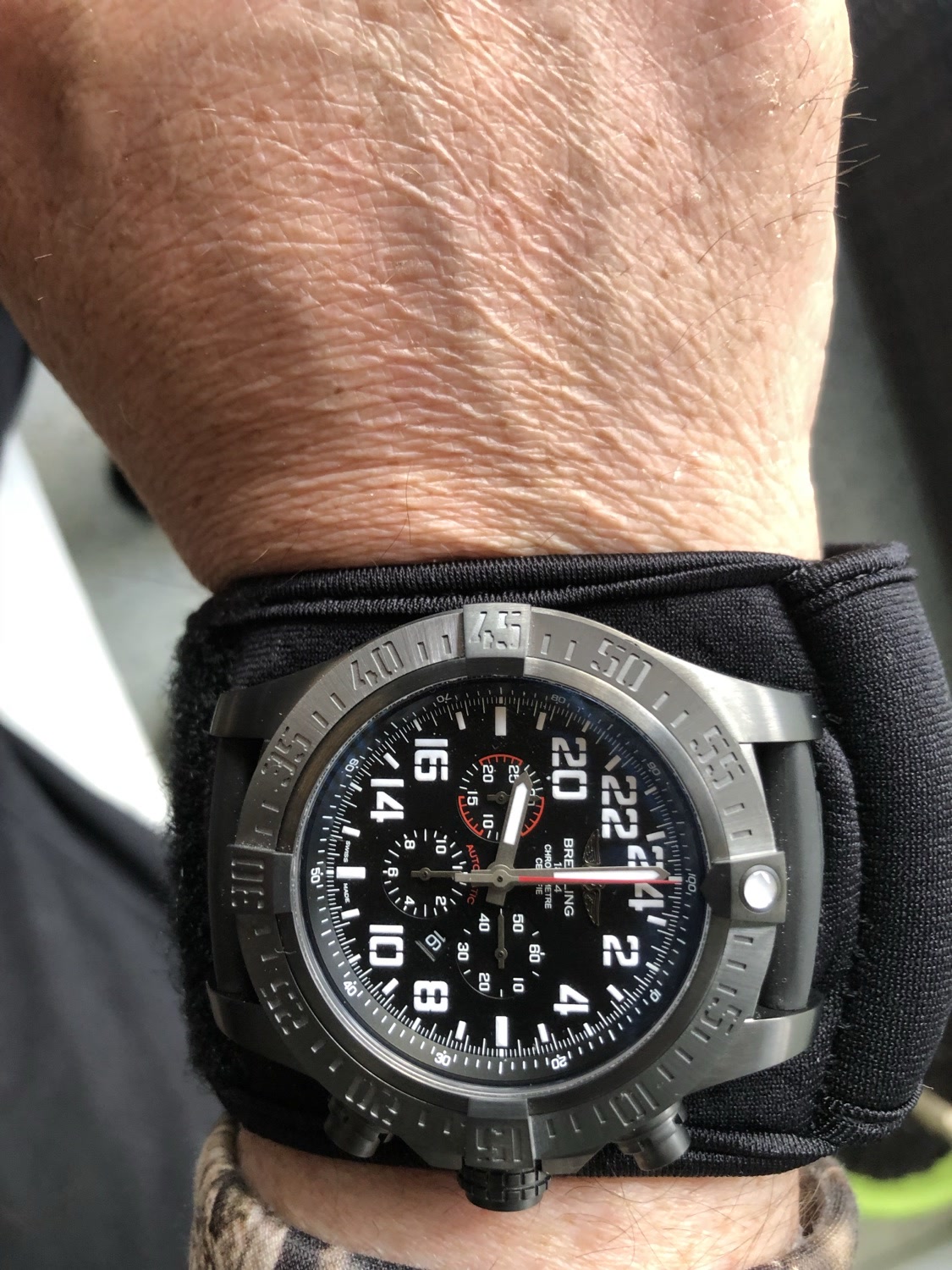 Black WATCH-ET with a Breitling chronograph