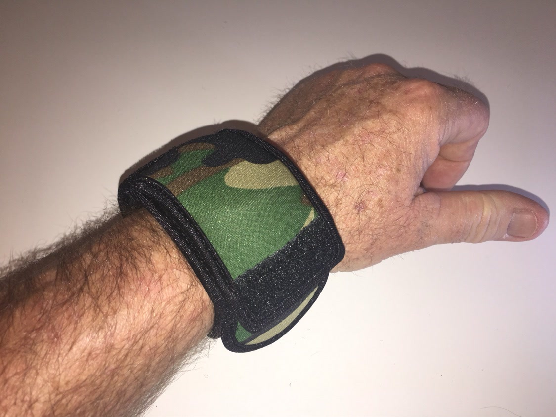 Camo WATCH-ET worn on the wrist, flap closed