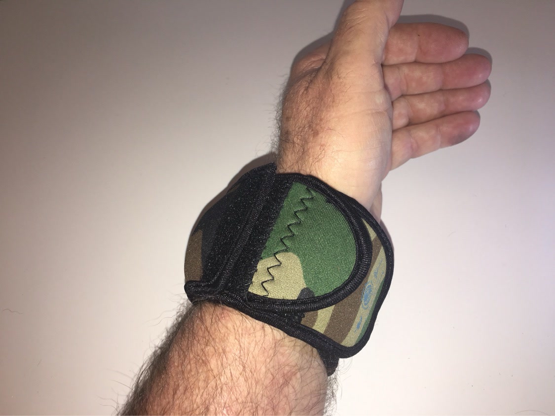 Camo WATCH-ET with cover flap folded back showing the logo print